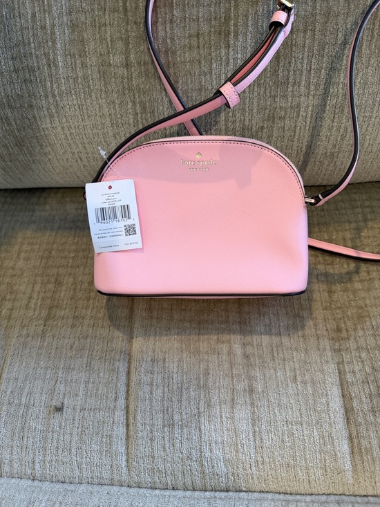 kate spade Handbags - Kate Spade Pink small domed Crossbody Crossbody Bag Saffiano 7 1/2 by 6 new